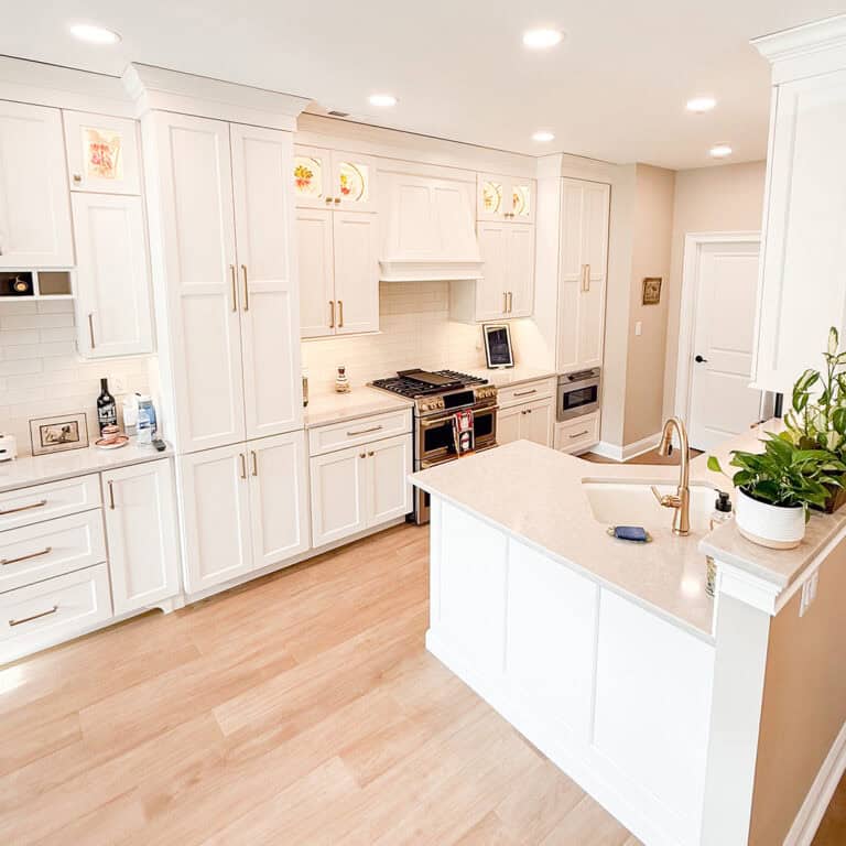 Modern kitchen with new appliances, custom cabinets, and high-quality countertops.