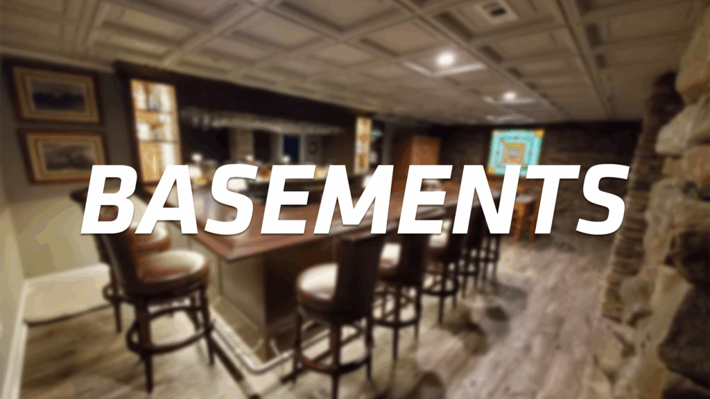 A blurred image of a finished basement with a bar, high chairs, wood floors, stone walls, and framed pictures, overlaid with the word “BASEMENTS” in bold white text.