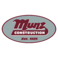A maroon and gray oval logo with the text Munz Construction in bold letters and Est. 1985 underneath.