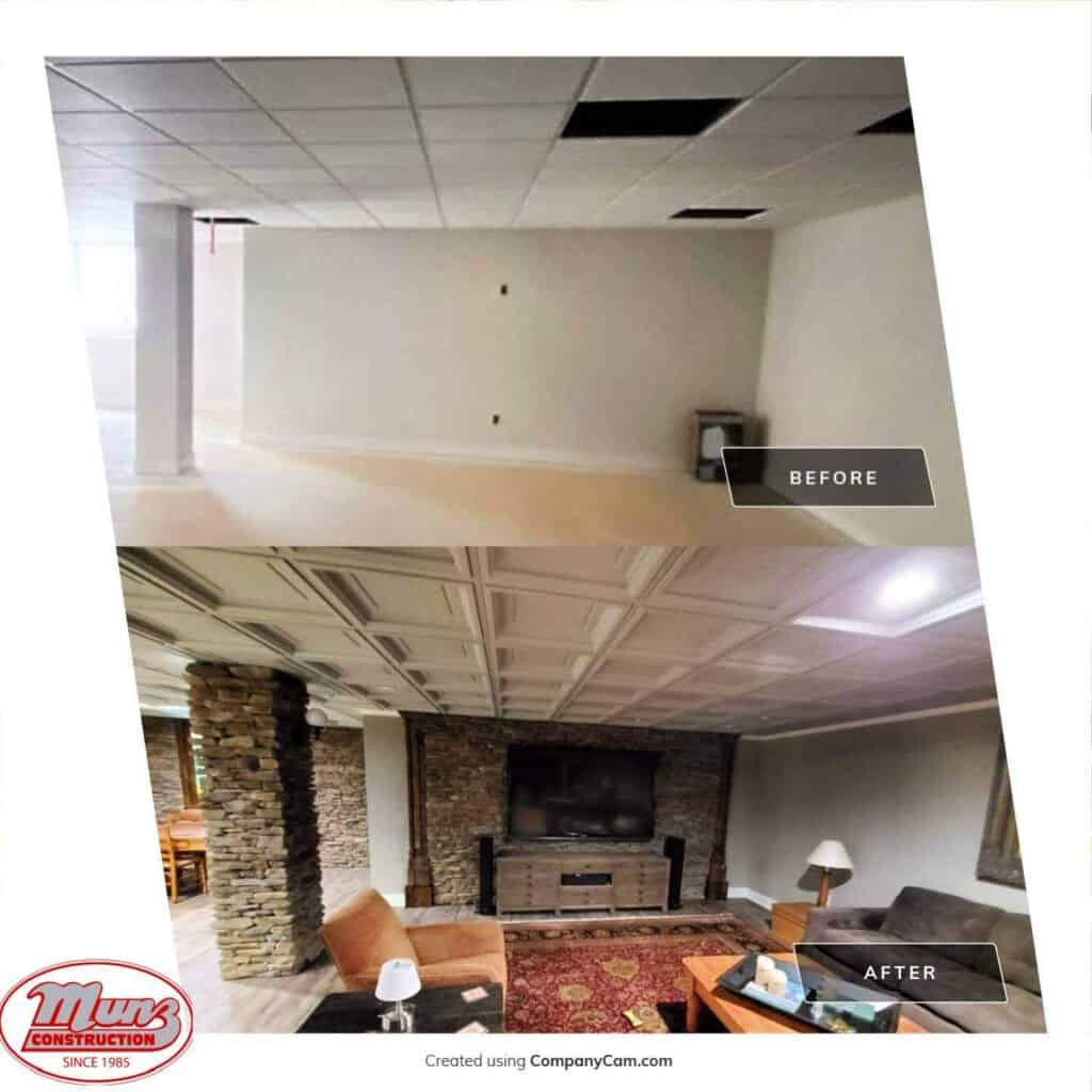 before and after images of a basement renovation. the before shows a plain white room with drop ceiling tiles. the after shows a finished basement with stone pillars, a tv, couches, wood accents, and decorative ceilings.